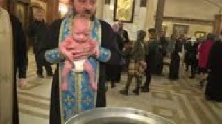 Five hundred infants baptized in a single ceremony [upl. by Niboc69]